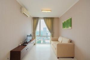 Nice and Homey 2BR Apartment at FX Residence By Travelio