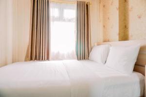 Comfort Stay 2BR at Green Pramuka City Apartment By Travelio