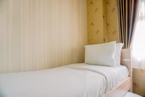 Comfort Stay 2BR at Green Pramuka City Apartment By Travelio
