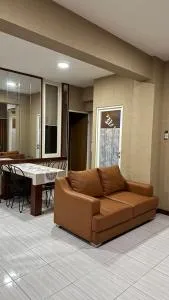 Cozy Apartment Puncak Dharmahusada 3BR 70m2 - Plosobegem