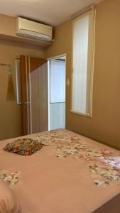 Apt 09 Puncak Dharmahusada 3BR Free Wifi Netflix