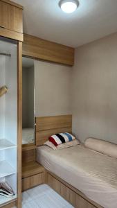 Apt 09 Puncak Dharmahusada 3BR Free Wifi Netflix