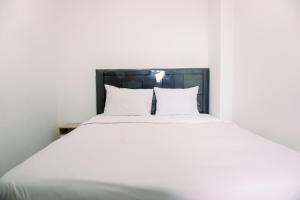 Comfort and Homey 2BR Belmont Residence Puri Apartment By Travelio