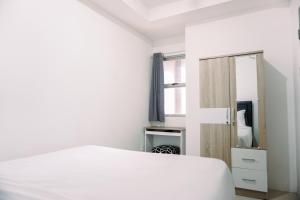 Comfort and Homey 2BR Belmont Residence Puri Apartment By Travelio