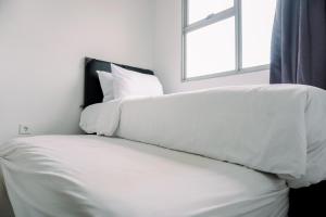 Comfort and Homey 2BR Belmont Residence Puri Apartment By Travelio