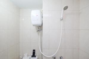 Modern Studio with Great Lake View at Springlake Summarecon Apartment By Travelio