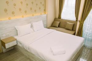 Simple and Cozy Studio Apartment at Urban Heights Residences By Travelio