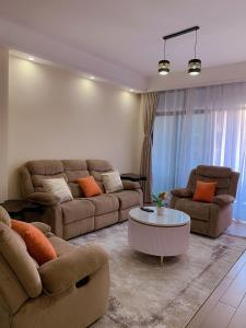 classy executive two bedroom apartment with fully equipped gym ample parking space heated swimming pool children playing ground and amazing scenic views