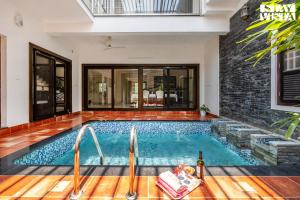 StayVista at Orchid Haven with BBQ, Pool