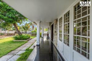 StayVista at Orchid Haven with BBQ, Pool