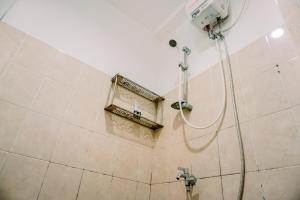 Studio Furnished with Comfort Design Green Bay Pluit Apartment By Travelio