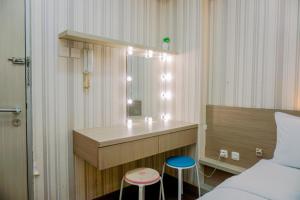 Studio Furnished with Comfort Design Green Bay Pluit Apartment By Travelio