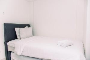 Fully Furnished 2BR Apartment at Akasa Pure Living BSD By Travelio