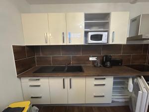 Appartements Ets Levillain - Hotel Les Caletes : photos des chambres