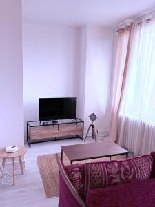 Appartements Appartement spacieux au centre-ville : photos des chambres