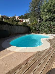 Appartements Rez de jardin, piscine privative residence de standing : photos des chambres