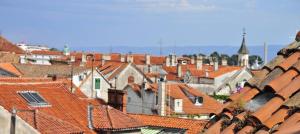 Room with the city and sea view