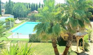 Maisons de vacances Tropica Nimes Chalet 2 chambres confort climatise : photos des chambres