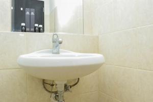 Nice and Homey 1BR at The Wave Kuningan Apartment By Travelio