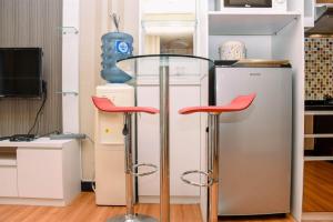 Nice and Homey 1BR at The Wave Kuningan Apartment By Travelio