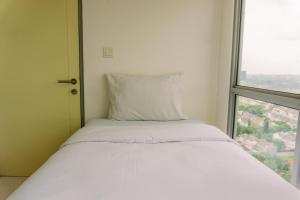 Well Furnished 2BR Apartment M-Town Residence near Mall By Travelio