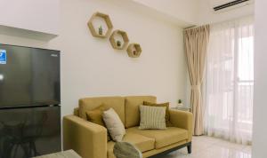 Well Furnished 2BR Apartment M-Town Residence near Mall By Travelio