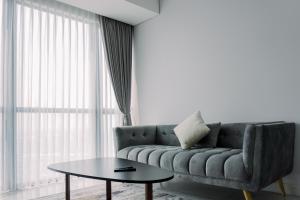 Wonderful and Homey 1BR The Smith Alam Sutera Apartment By Travelio