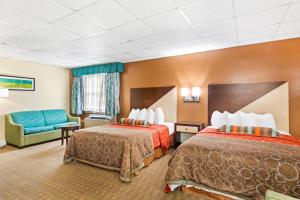 Large Family Room with Two Queen Beds and Sofa Bed - Non Smoking/Ground floor room in Rodeway Inn Historic