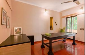SaffronStays Amaya - 5BR 300-year-old Kerala-style heritage villa with spa, stepped pond & farm-to-table meals near Kannur Airport