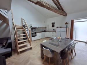 Appartements Le Temps Suspendu : photos des chambres