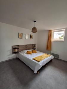 Appartements Le Temps Suspendu : photos des chambres