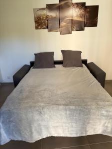 Appartements Appartement climatise avec jardin 4 personnes : photos des chambres