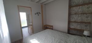 Maisons de vacances Maisonnette avec jardin : photos des chambres