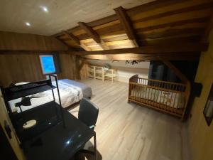 Maisons de vacances Le Fenil-Logis Sauna Bain Nordique Salle cinema : photos des chambres