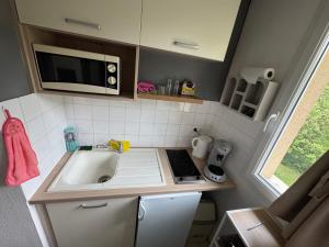Appartements Studio T1 piscine chauffee parking gratuit les hauts dhonfleur : photos des chambres