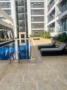 Luxurious one bedroom Apartment, Kilimani-Nairobi Kenya by Sana Sana Holiday Apartments