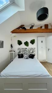 Maisons de vacances L-Oasis de Coulaines - Elegance & piscine : photos des chambres