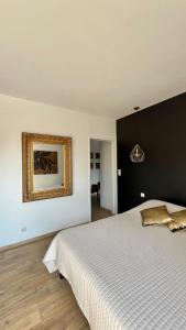Maisons de vacances L-Oasis de Coulaines - Elegance & piscine : photos des chambres