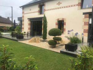 Maisons de vacances L-Oasis de Coulaines - Elegance & piscine : photos des chambres