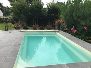 Maisons de vacances L-Oasis de Coulaines - Elegance & piscine : photos des chambres