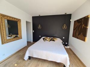 Maisons de vacances L-Oasis de Coulaines - Elegance & piscine : photos des chambres
