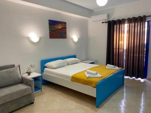 Deluxe Triple Room with Sea View room in Itaka Hotel