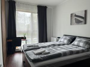 Nowy plażowy apartament z siłownią i halą garażową