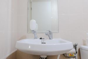 Homey 1BR Apartment with Extra Room at Parahyangan Residence By Travelio