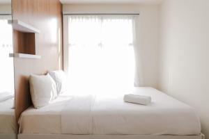 Homey 1BR Apartment with Extra Room at Parahyangan Residence By Travelio