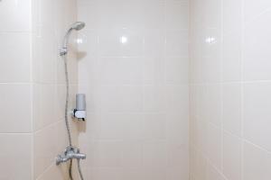 Homey 1BR Apartment with Extra Room at Parahyangan Residence By Travelio