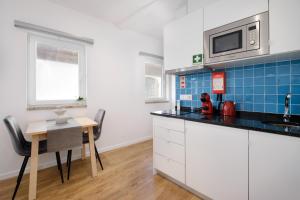 Riverside Studio By Luís Bridge, WOW & Half Rabbit