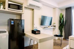 Homey and Cozy Studio Room Daan Mogot City Apartment By Travelio