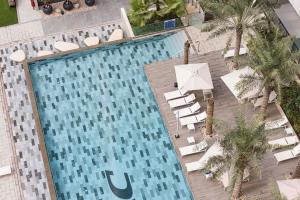 Outsider Vacation Homes - Cozy & Chic 1BR Walk to Metro Downtown Dubai in 5 min - 4hvězdičkové hotely ve městě Dubaj
