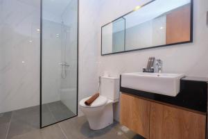 Minimalist and Homey 1BR at Ciputra World 2 Apartment By Travelio
